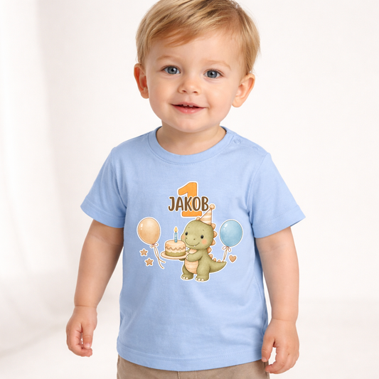 Baby T-Shirt hellblau mit Dino Motiv und Name Jakob zum 1 Geburtstag, niedliches Kinder Shirt mit Ballons und Kuchen, personalisiertes Geschenk