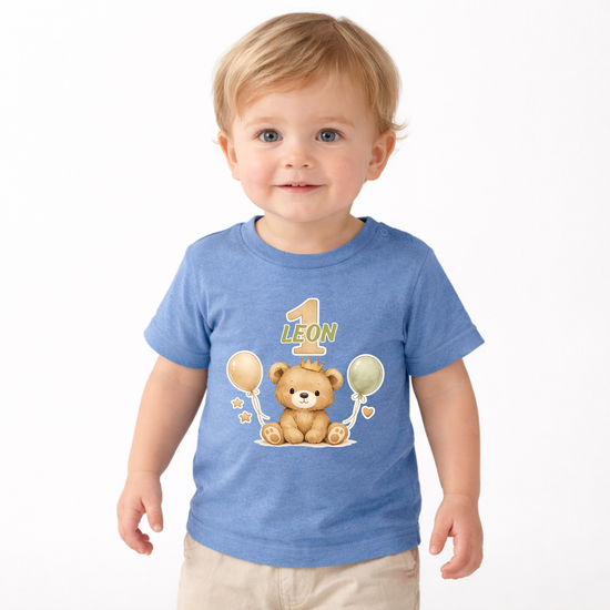 Blaues Baby T-Shirt personalisiert mit Name Leon und Zahl 1, süßer Bär mit Krone und Ballons, ideales Geschenk zum ersten Geburtstag Jungen