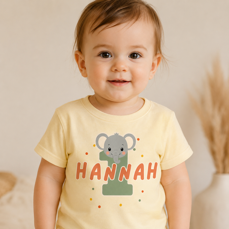 Babyshirt 1. Geburtstag in Hellgelb mit Elefant, personalisiertem Namen Hannah und Konfetti-Design