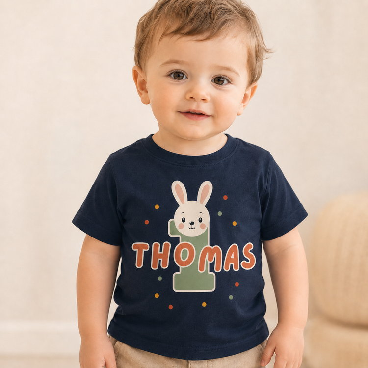 Navy Babyshirt erster Geburtstag mit Hase, Name Thomas und kindgerechtem Tiermotiv